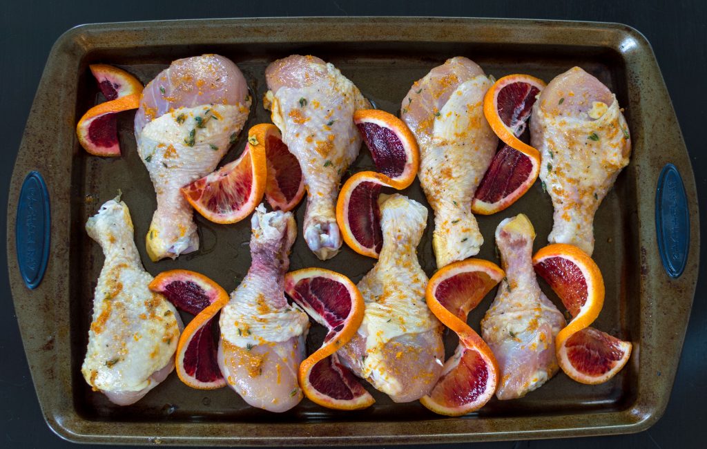 These blood orange and ginger chicken drumsticks come to together so easy, but look so stunning. This recipe is great to serve to company or for when you want a little more excitement in your week night dinner rotation. A mix of oranges ginger, and thyme gives it a zesty, tang that will leave you licking your fingers! thesimplesupper.com