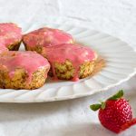 muffins with strawberries on white plate